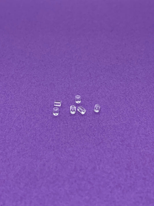 6 kpl kirkkaita korvakorujen silikonistoppareita.